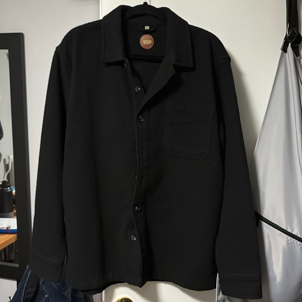 Common people 
Elon over shirt